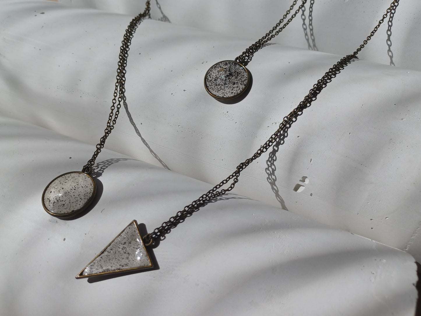 Brass pendant on a chain // gypsum freckled pendant