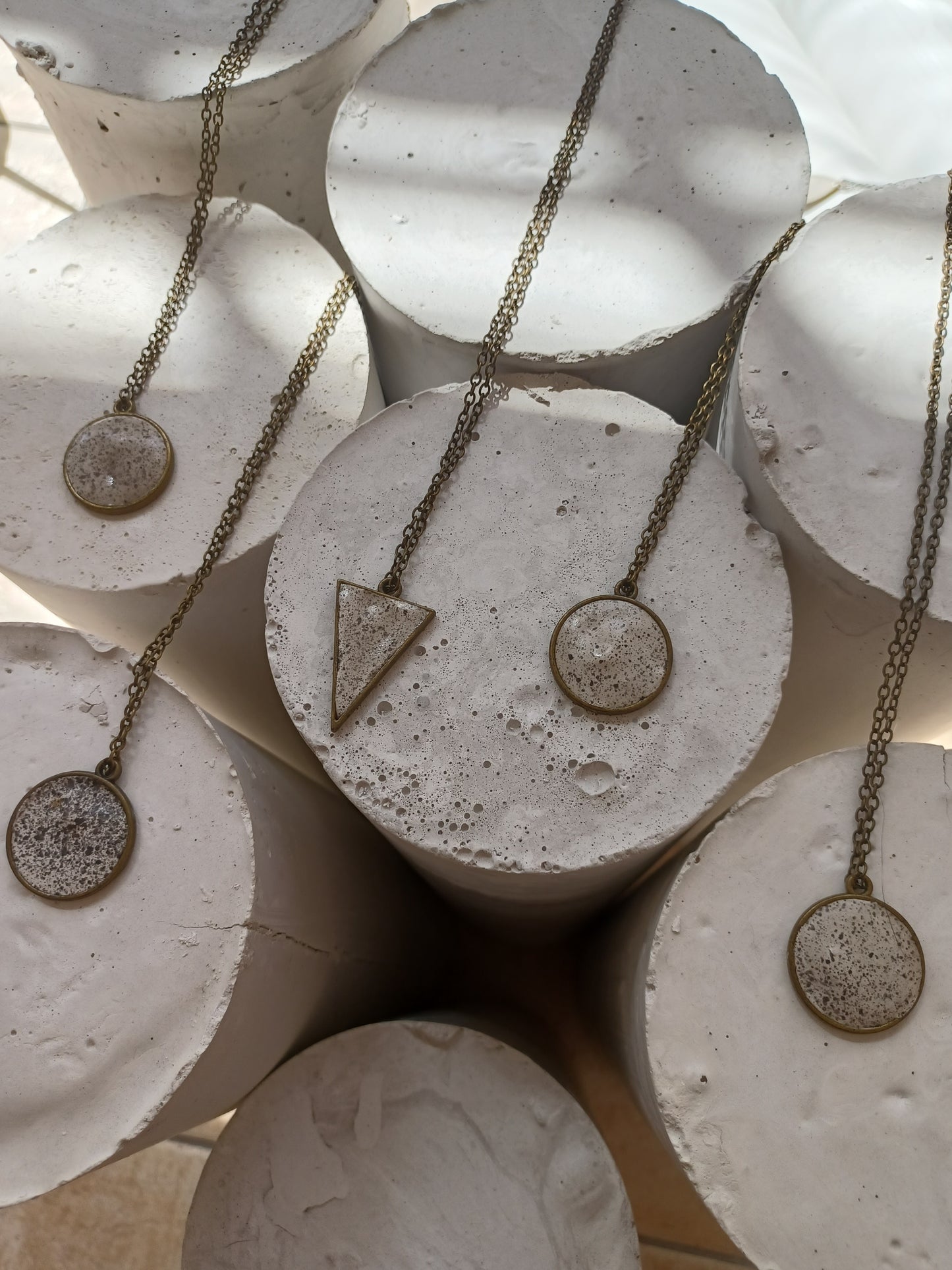 Brass pendant on a chain // gypsum freckled pendant