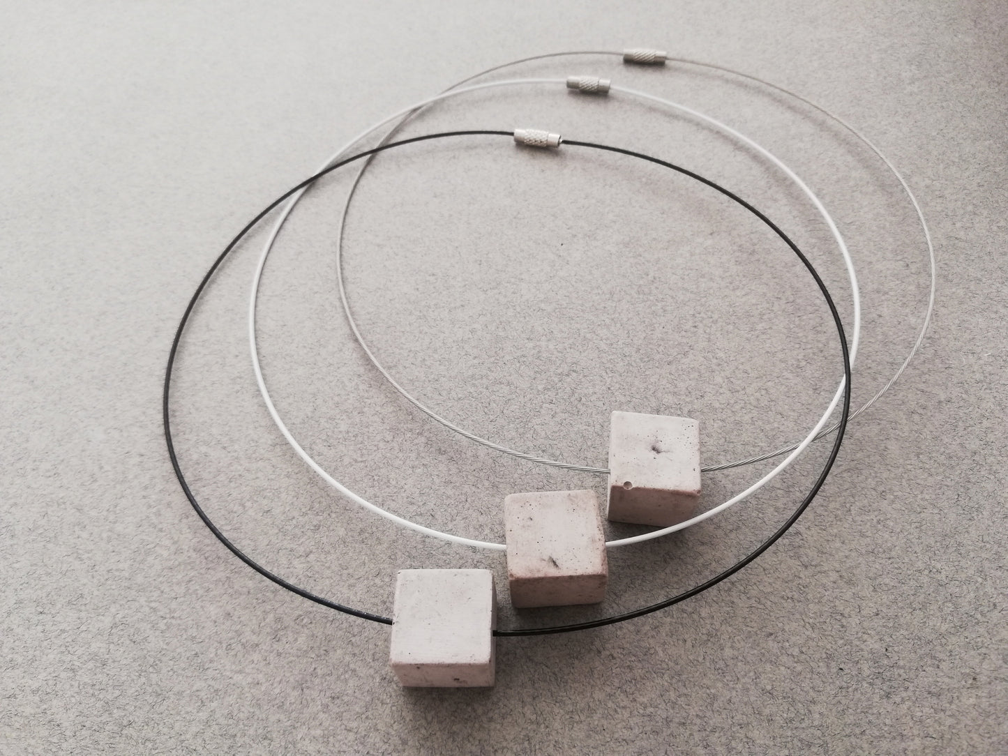 wire necklace // plaster gray cube