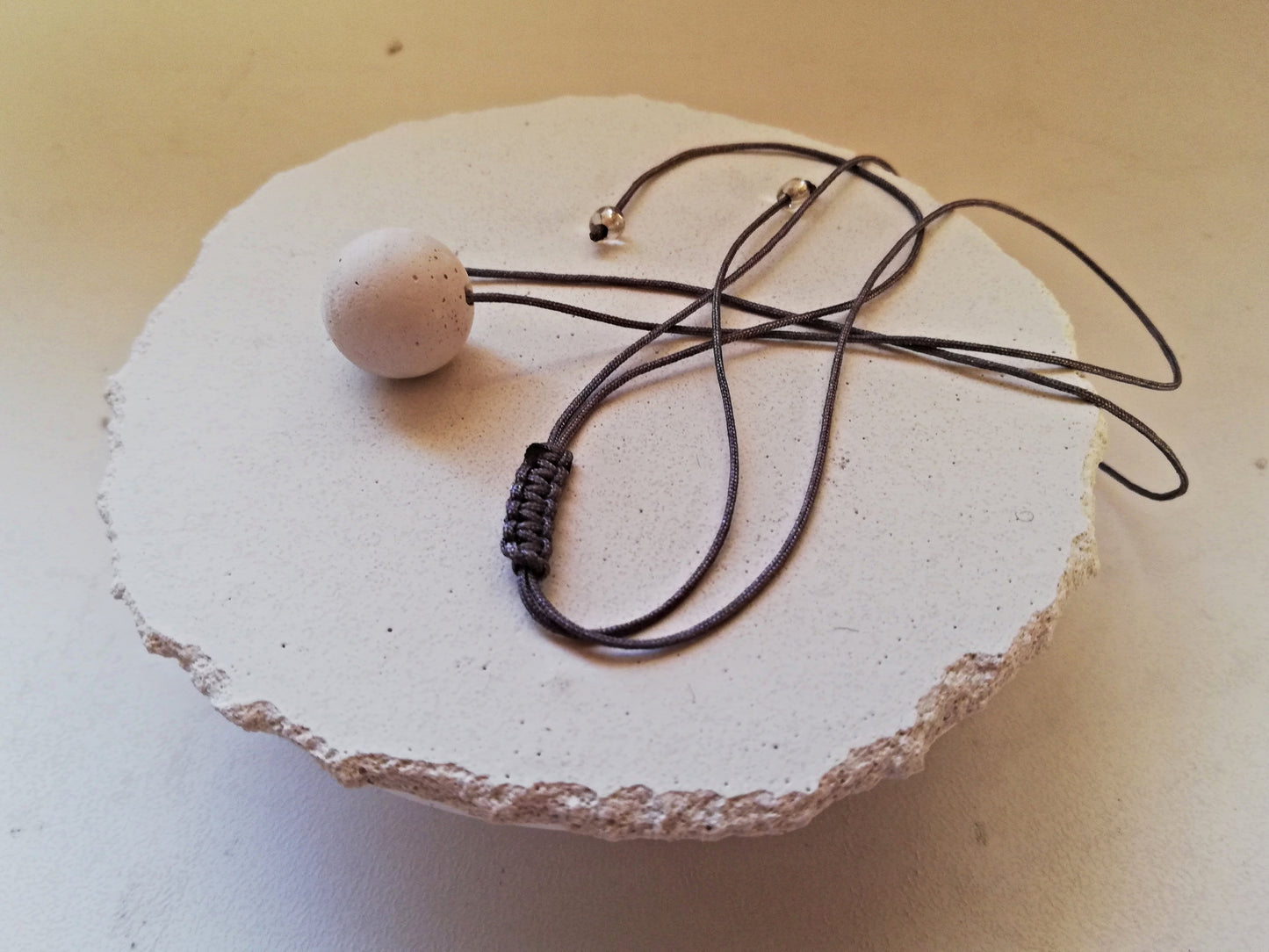 Concrete sphere necklace on a cord //plaster gypsum//